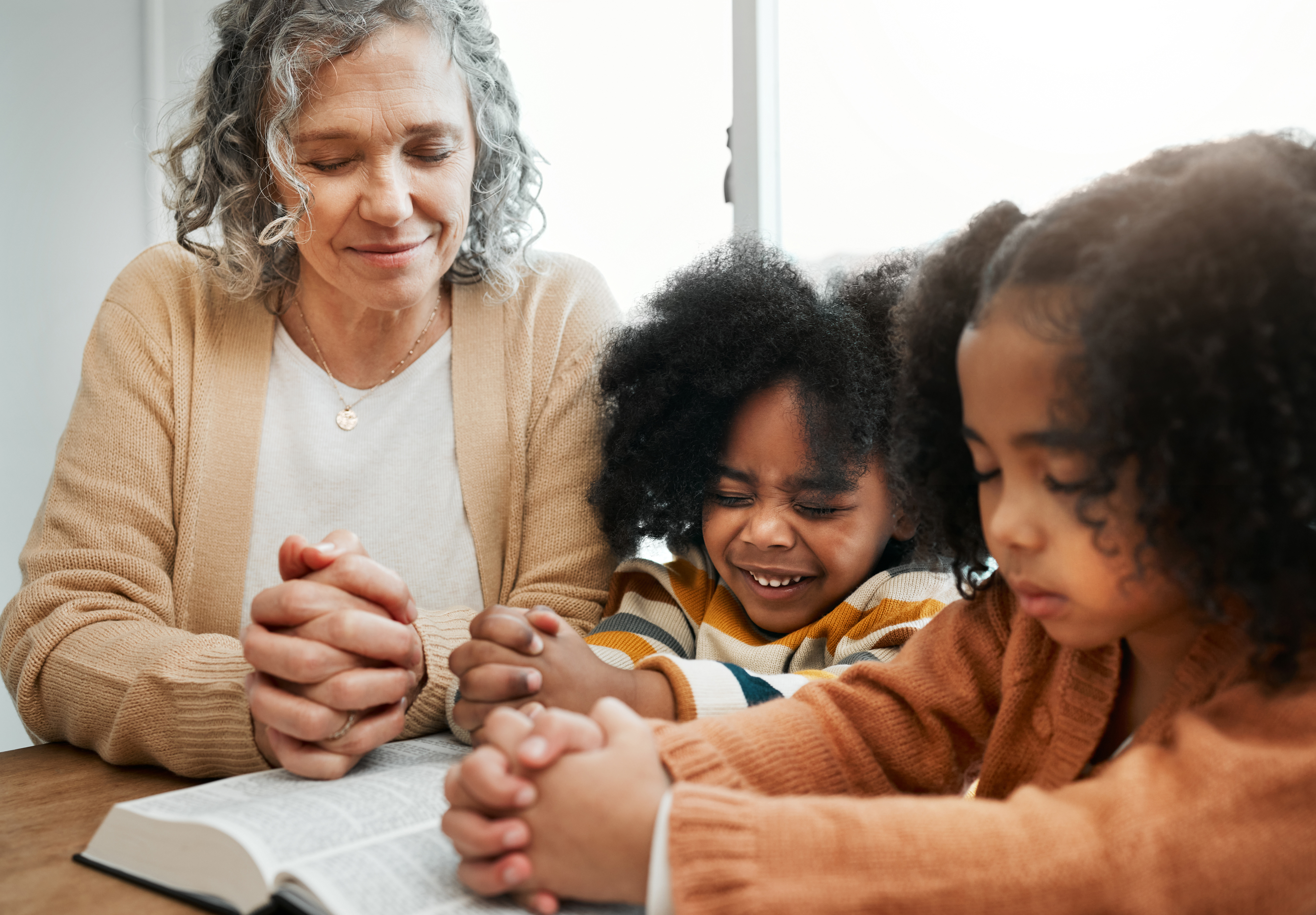 bible-prayer-or-grandmother-praying-with-kids-or-2023-03-23-22-47-59-utc