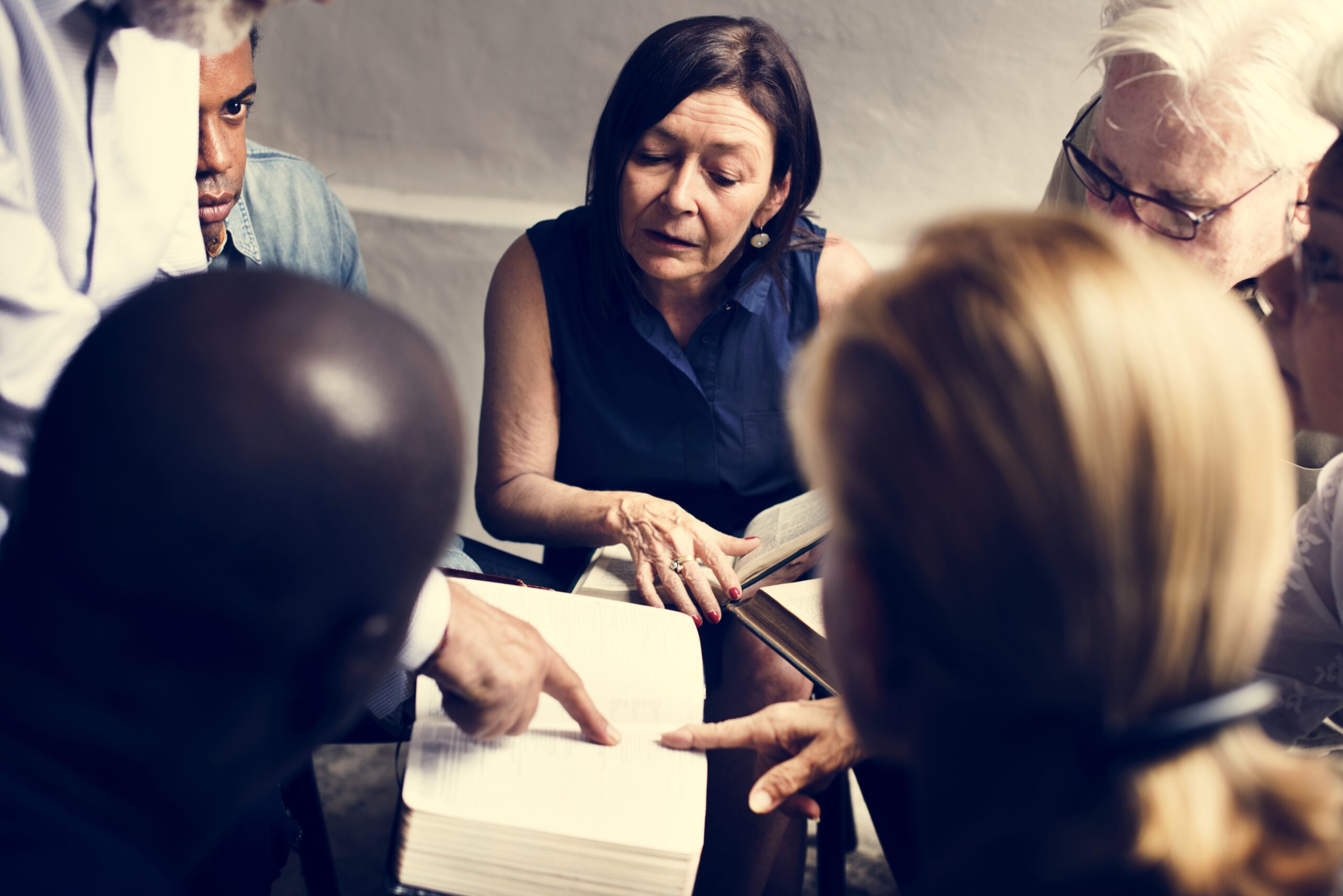 Group christianity people reading bible together