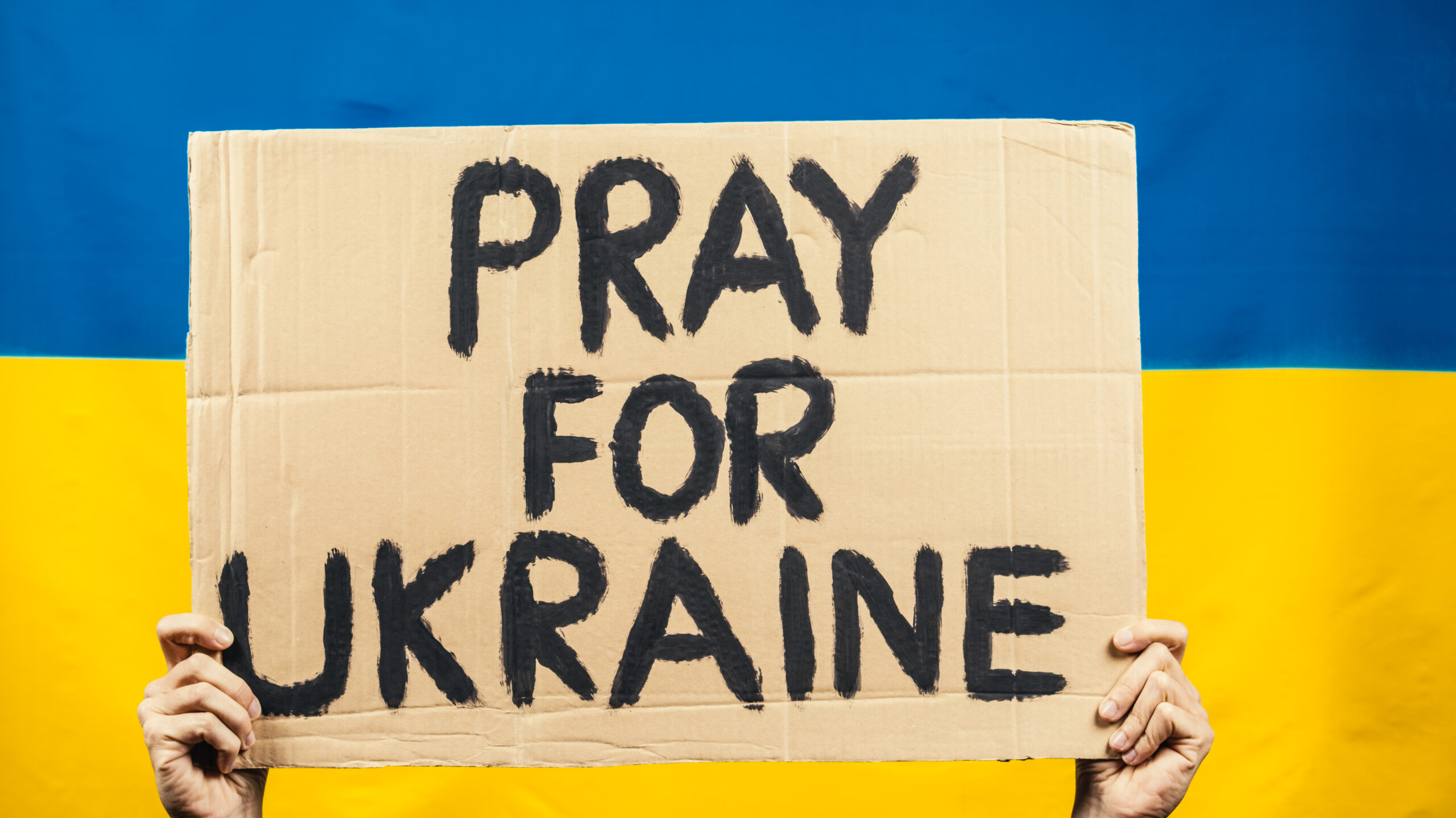 cardboard-saying-pray-for-victims-in-ukraine-with-2023-11-27-04-59-38-utc